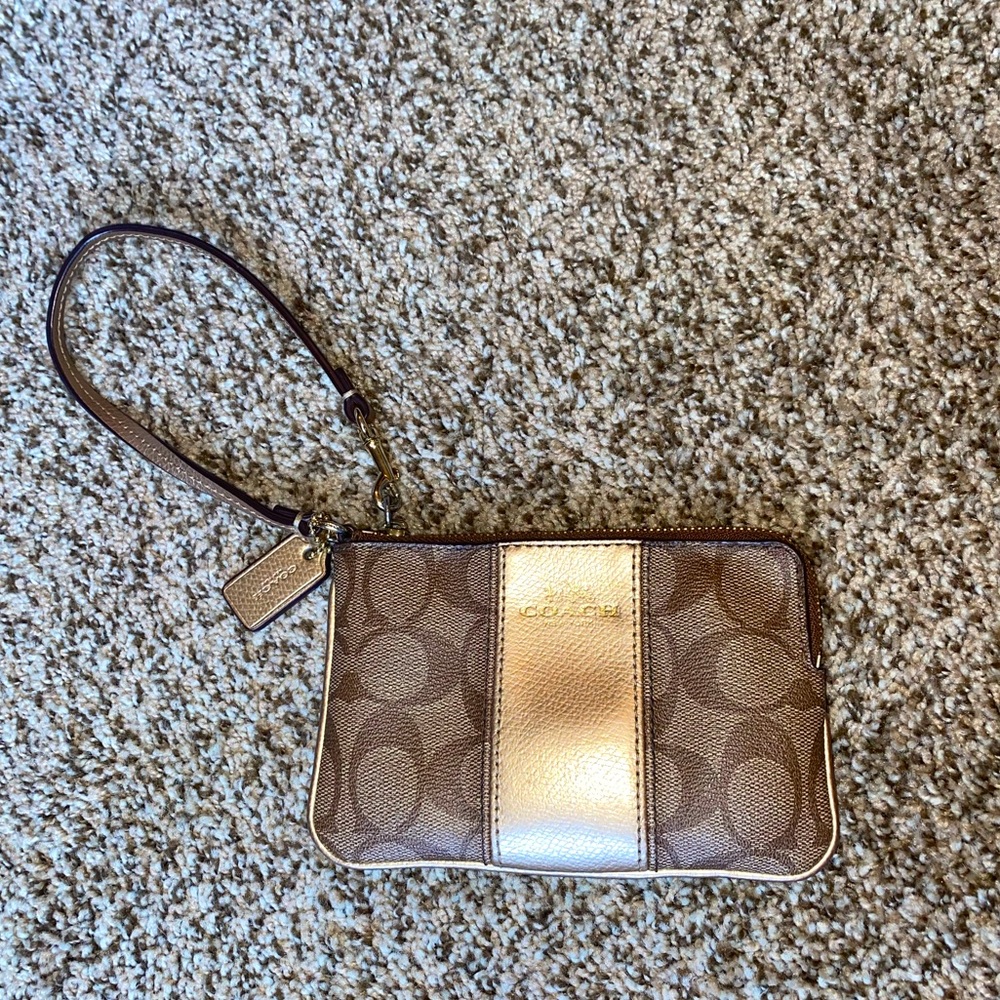 Coach tan and gold wristlet
